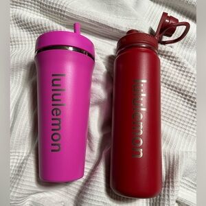 2-24oz Lululemon water bottles.